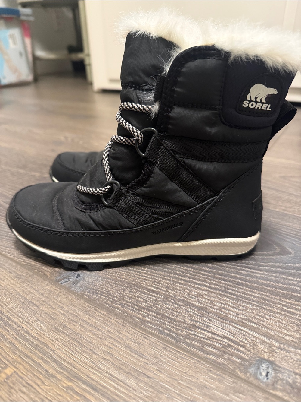 Never worn Sorel Kids Black Winter Boots with White Faux Fur Trim